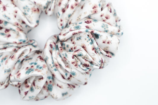 Floral patterned scrunchie on a white background