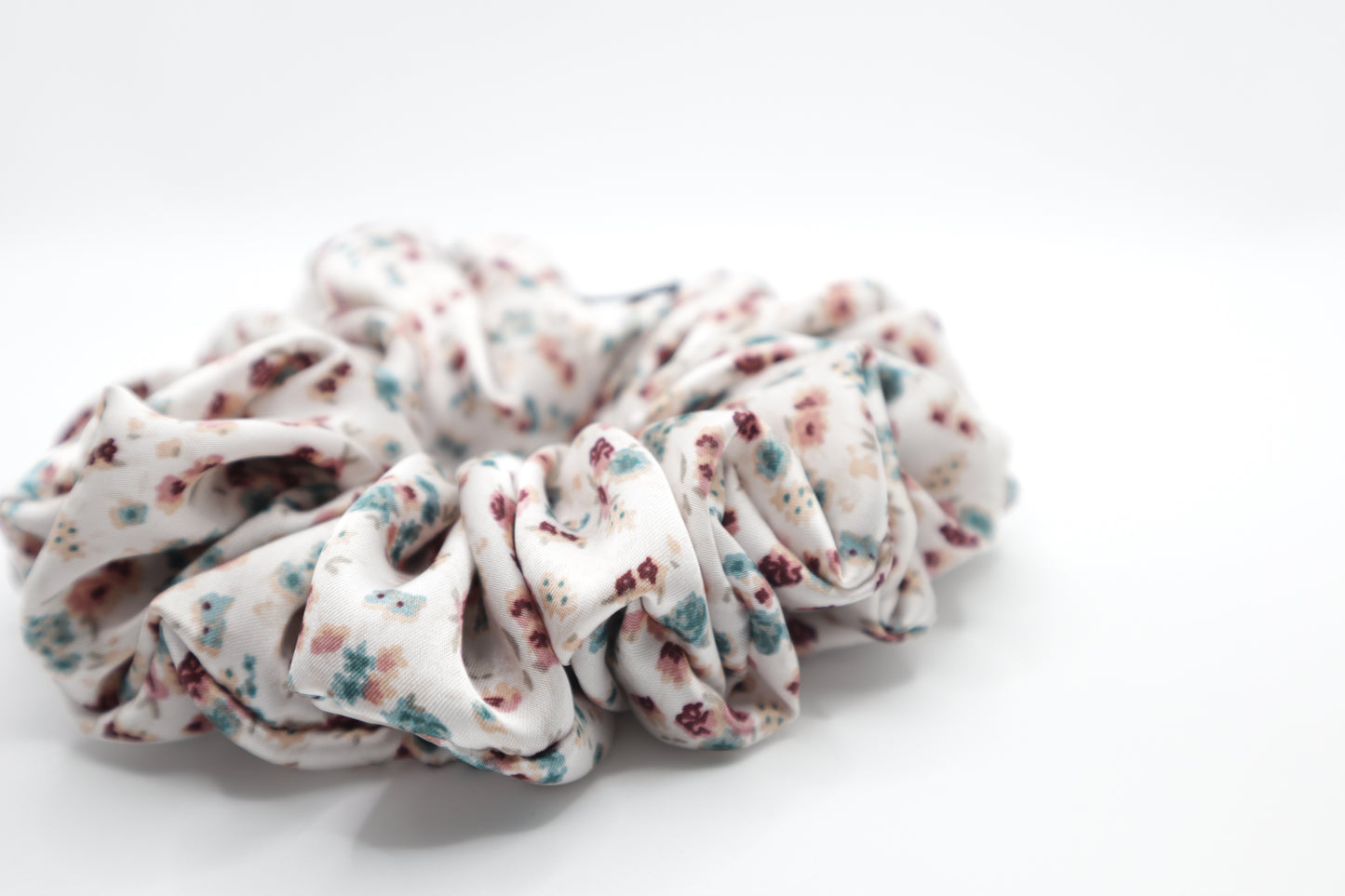 Floral patterned scrunchie on a white background