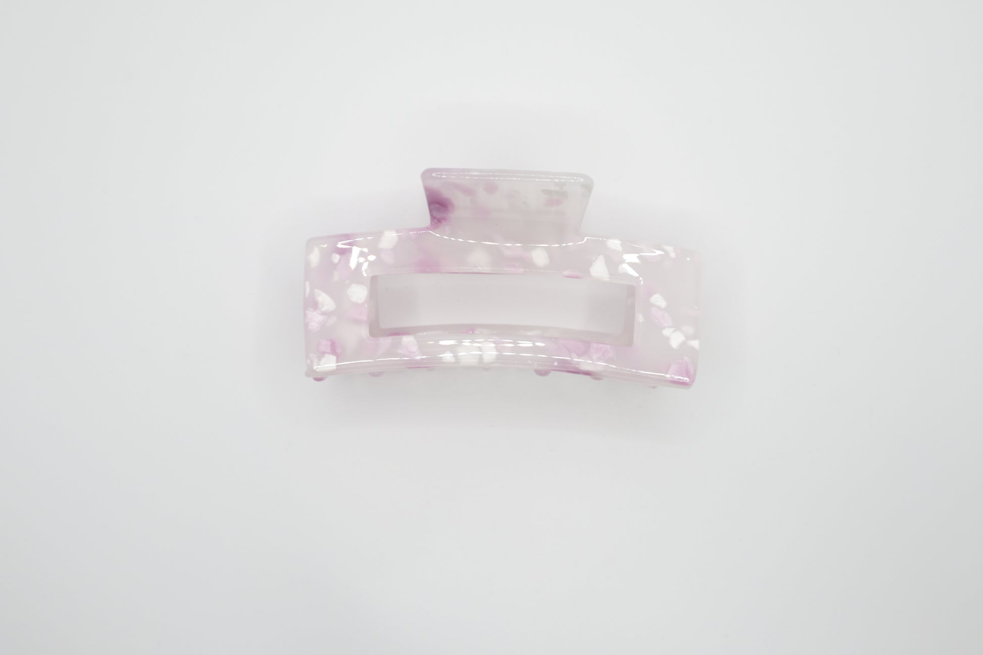 Pink hair clip on a white background
