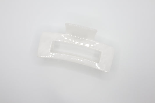 White rectangular hair claw clip on a white background