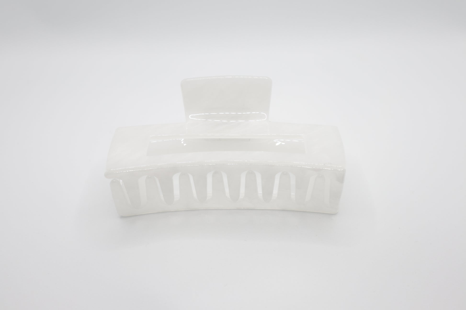 White rectangular hair claw clip with on a white background